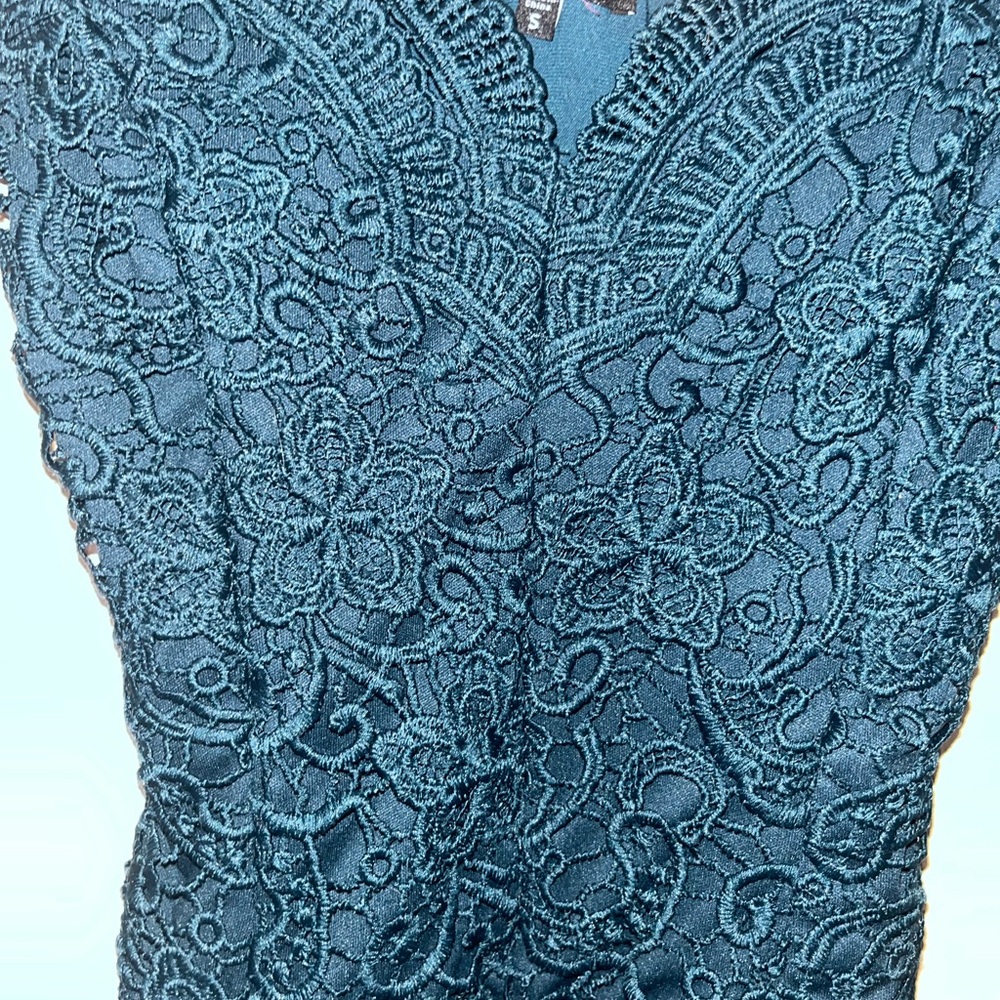 Green lace body suit